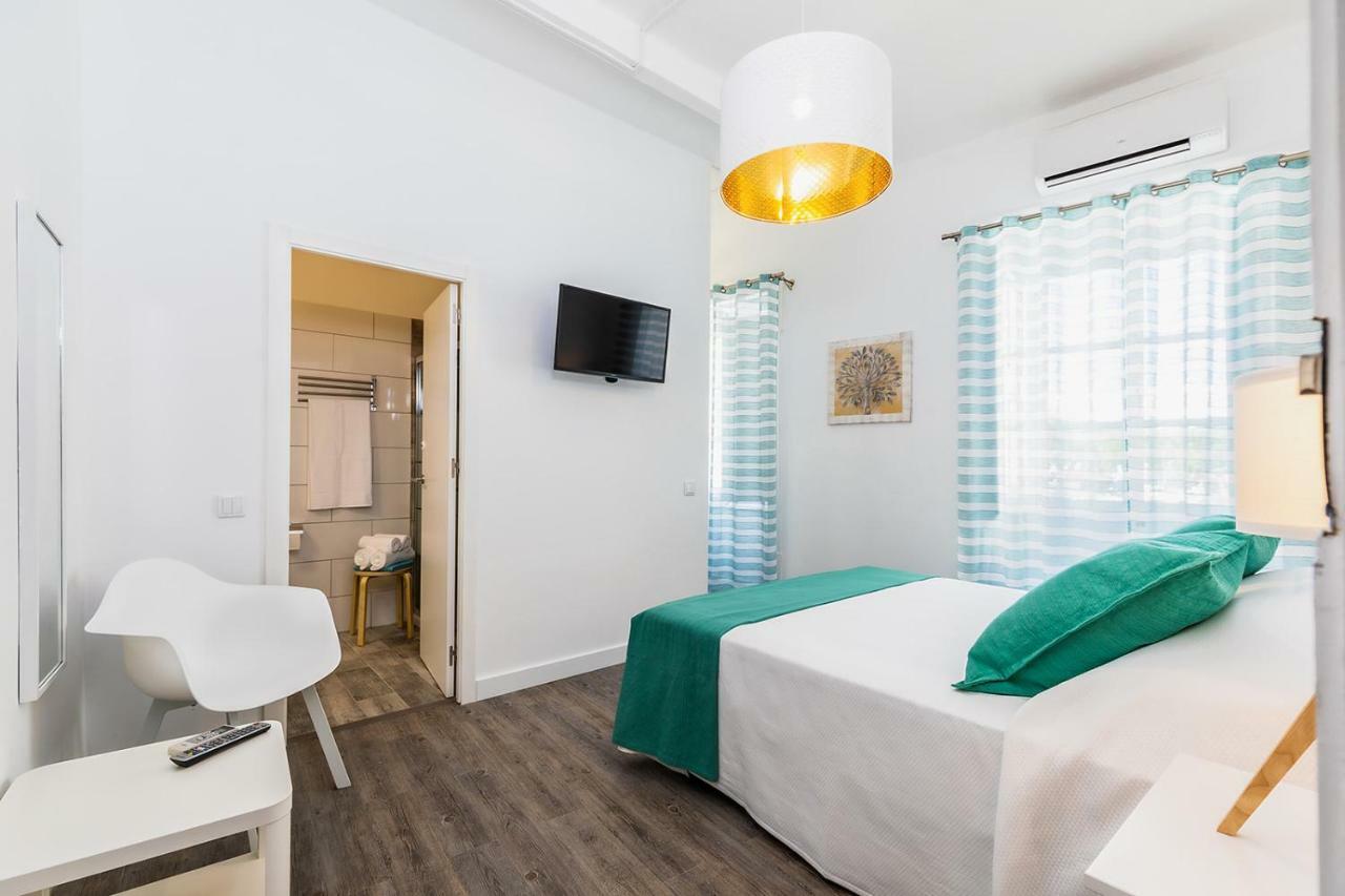 Quarto Duplo com Casa de Banho Privativa
